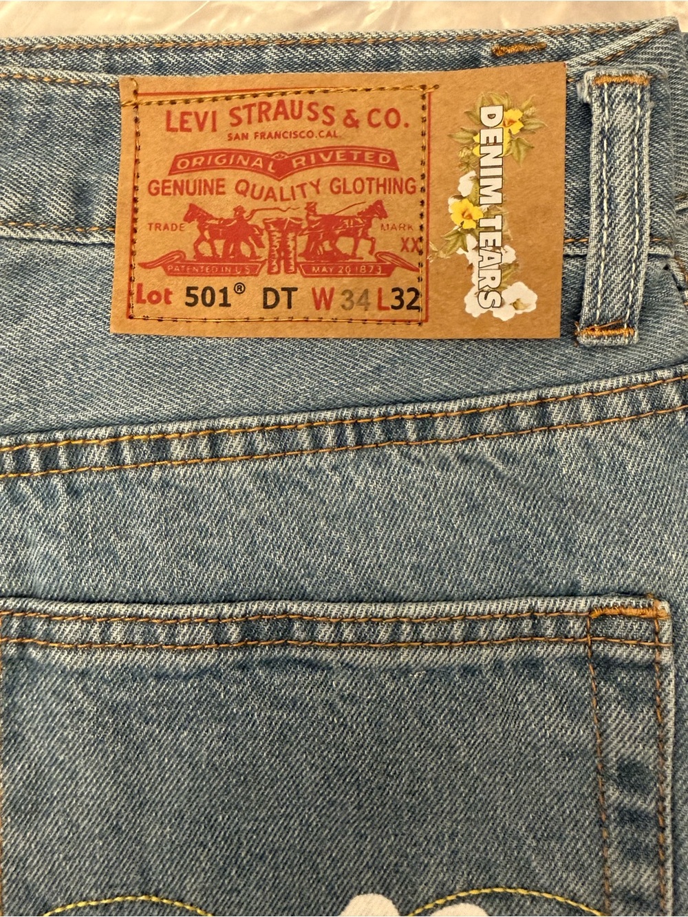 Light Blue Straight-Leg Jeans with White Floral Prints - Picture 2 of 3